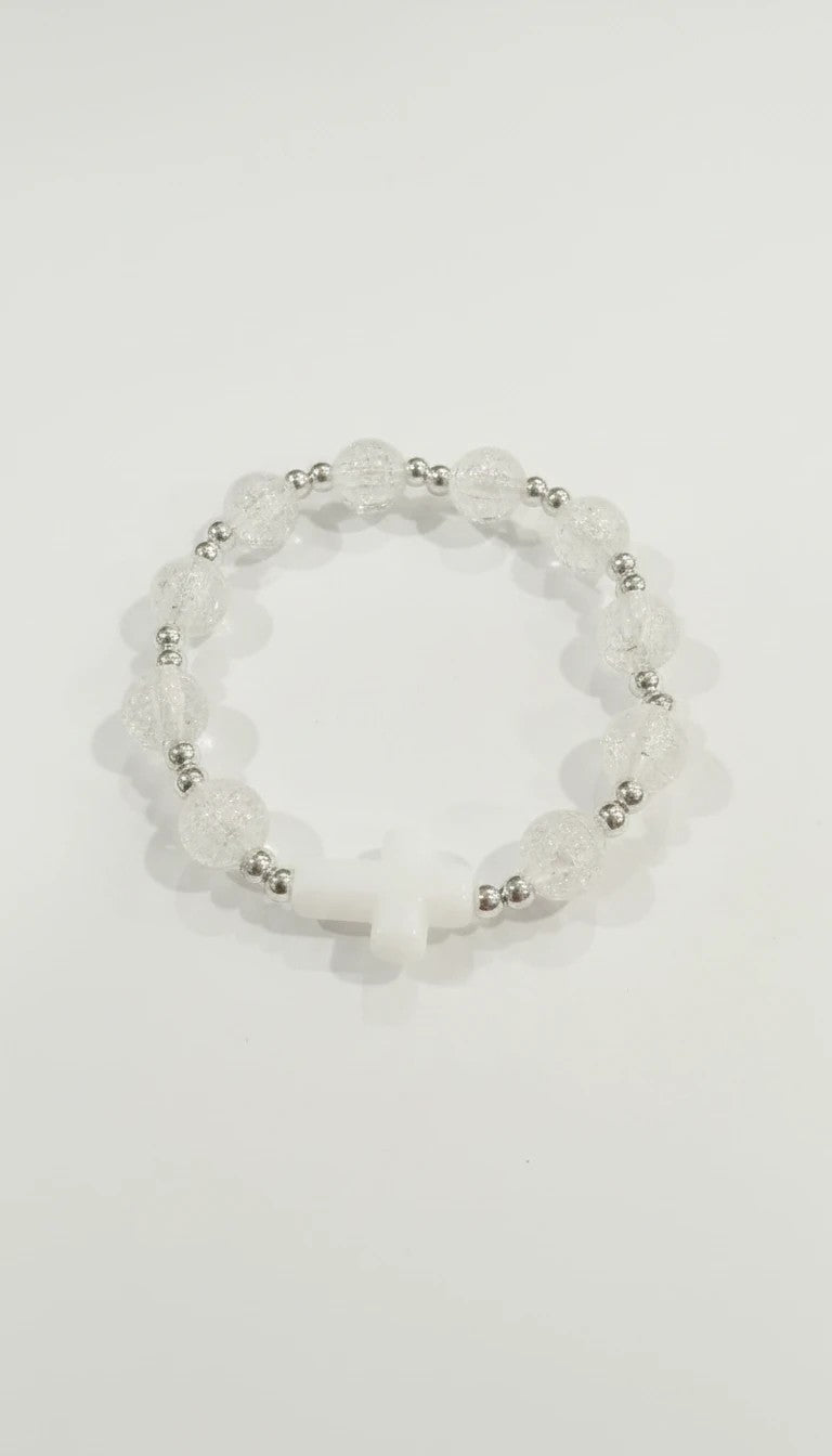 Jefgo stretch bracelet featuring clear crackle-glass beads, silver-tone spacers, and a central white cross charm.